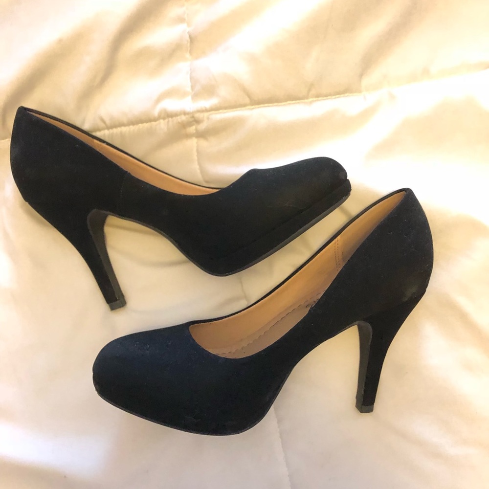 Black suede pumps